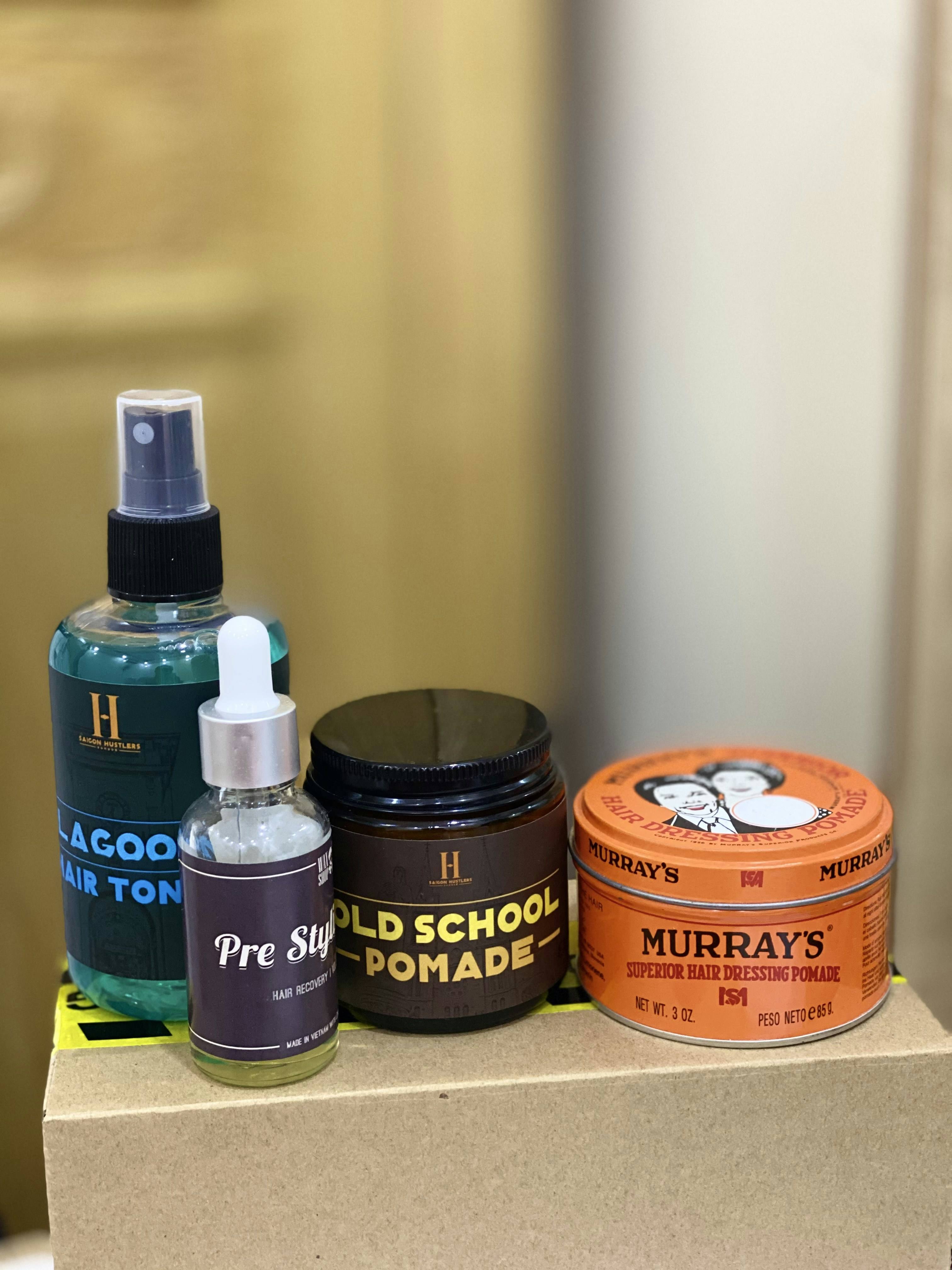 Box braids styling products featuring braiding hair extensions and moisturizing sprays