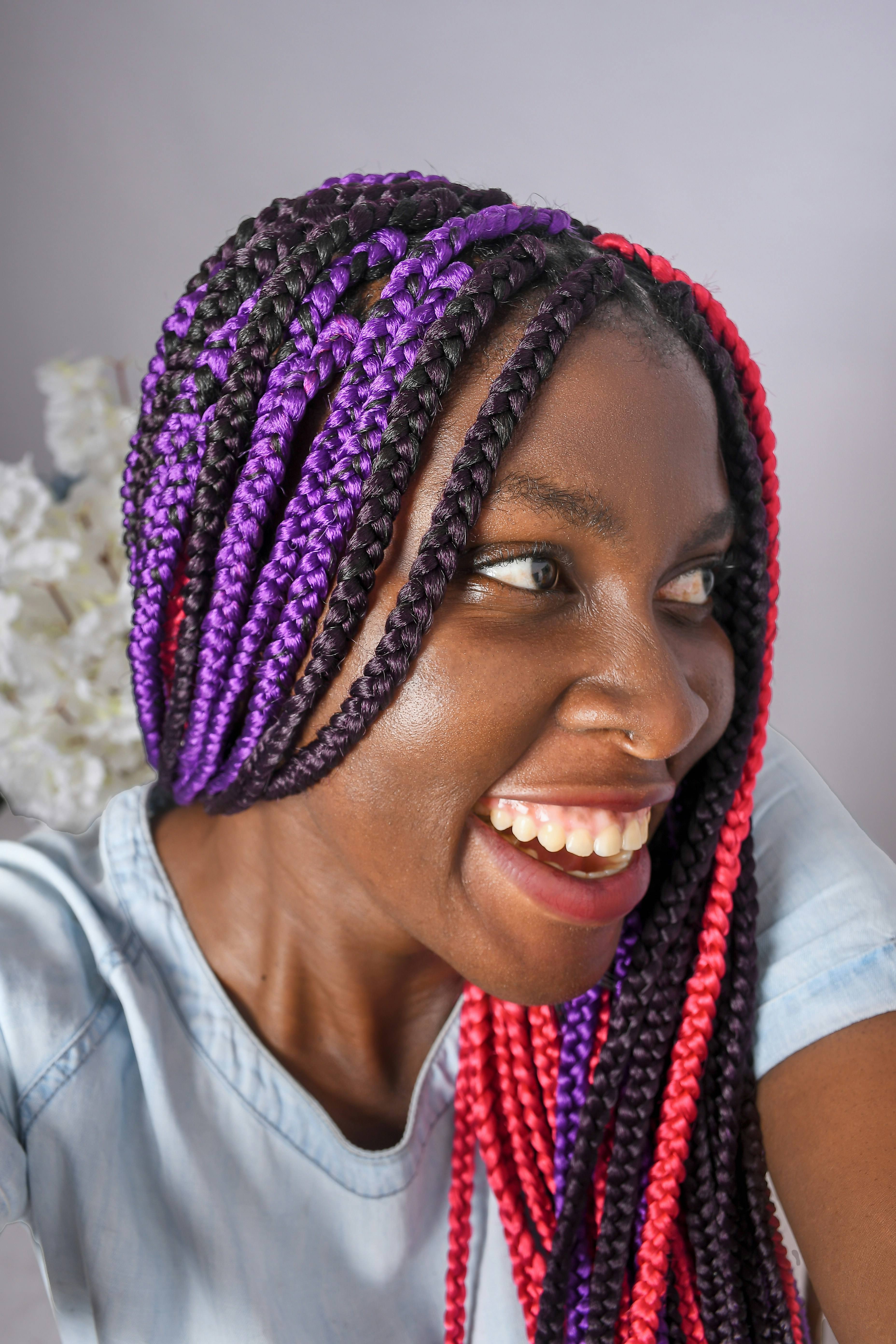 Woman with triangle parted box braids