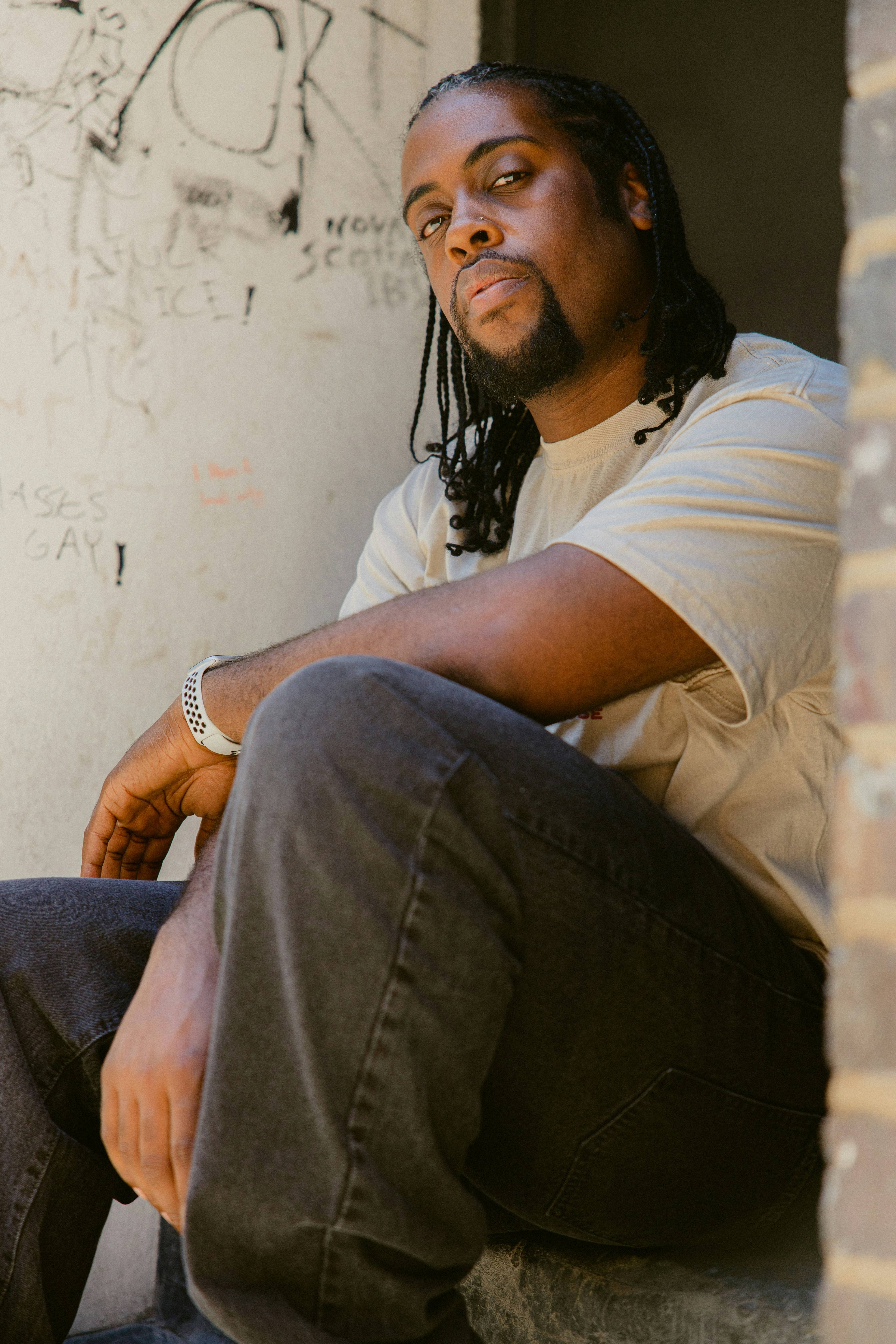 Man with neat straight-back cornrows