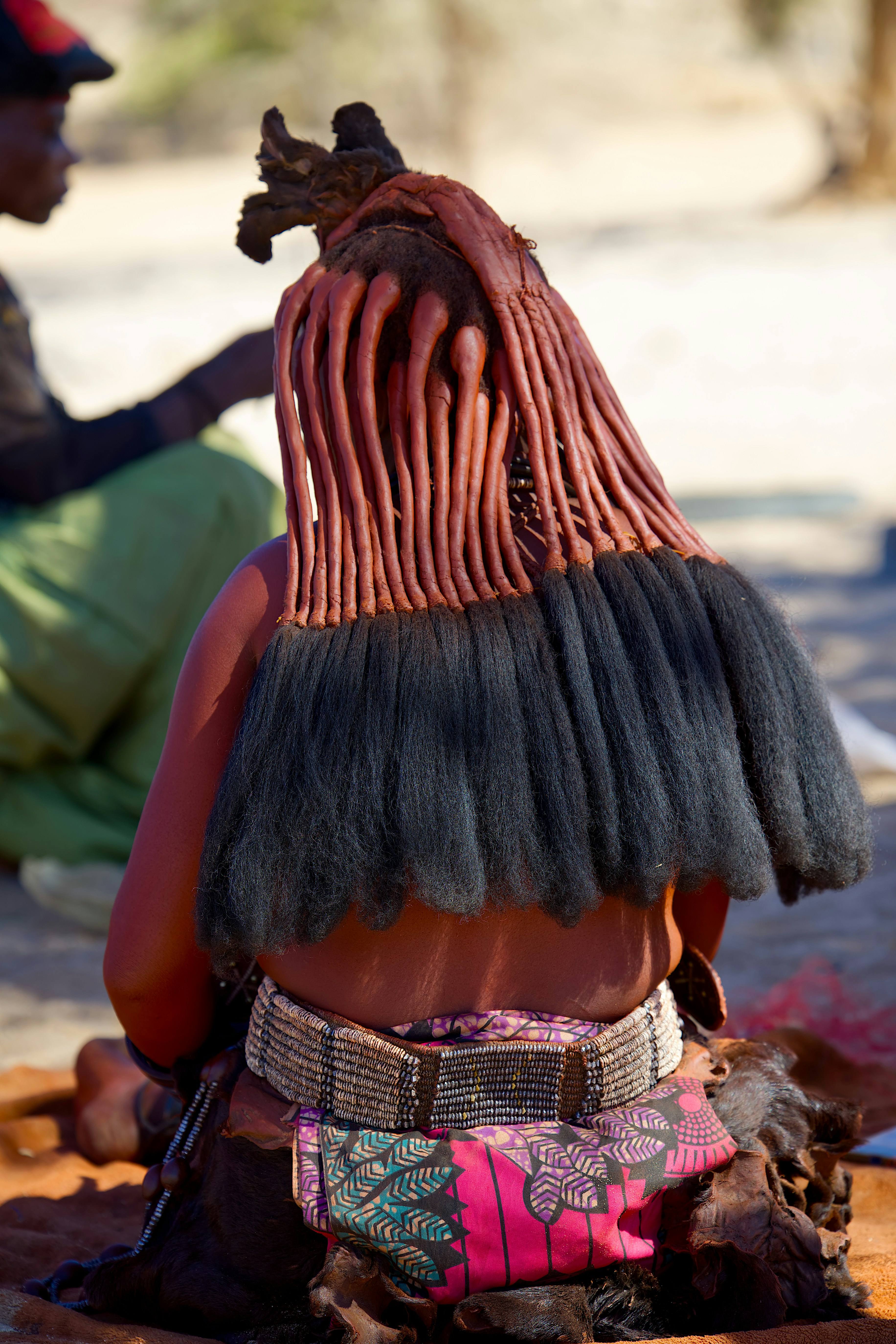 Black woman with traditional Hausa braids showing distinctive Northern Nigerian patterns